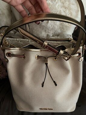Michael Kors Cream Canvas Drawstring Bucket Bag with Gold Hardware
